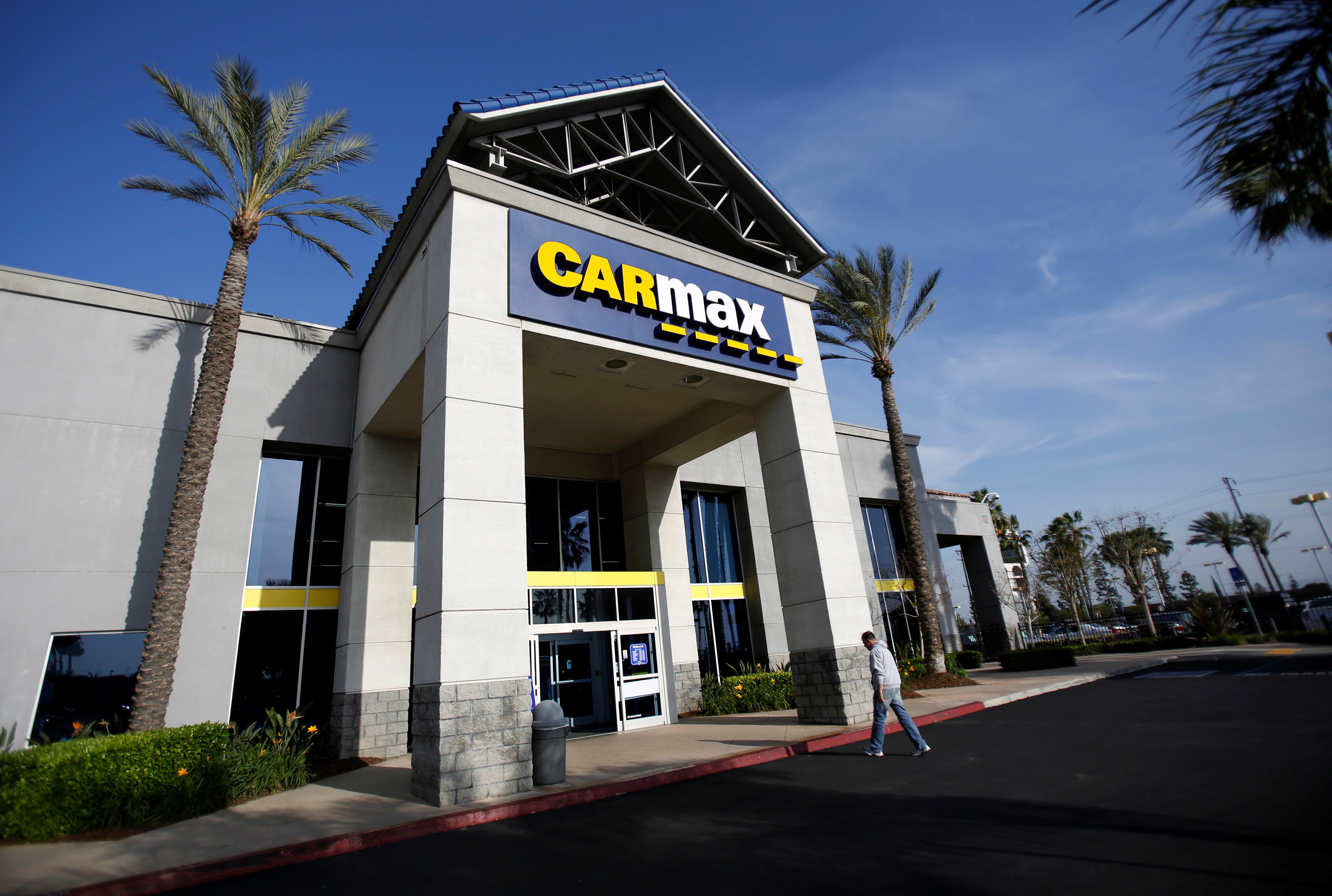 CarMax sales rise for first time in two years as used car demand revs up |  Reuters