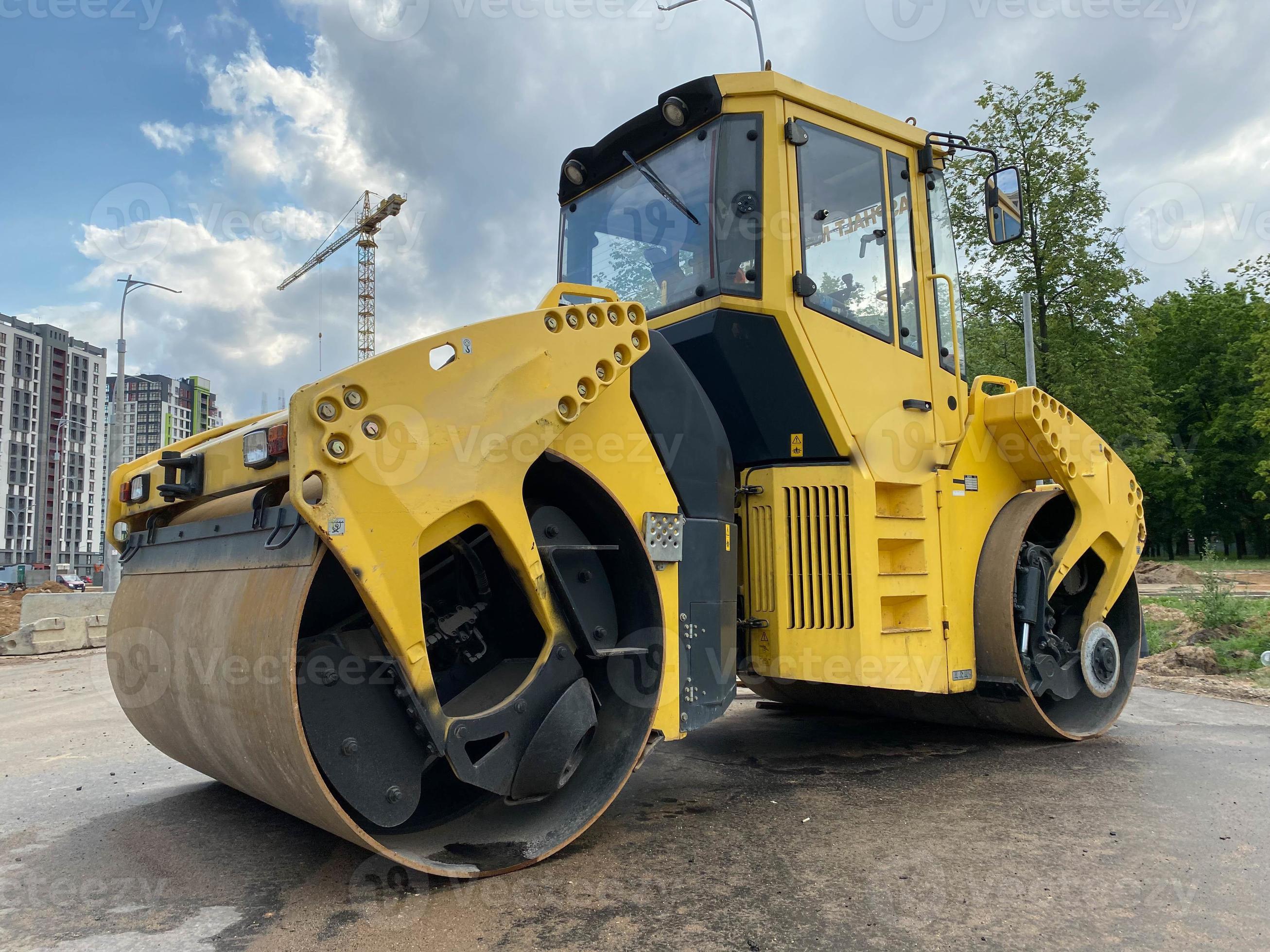 Yellow powerful large new modern road roller for asphalt paving and ...