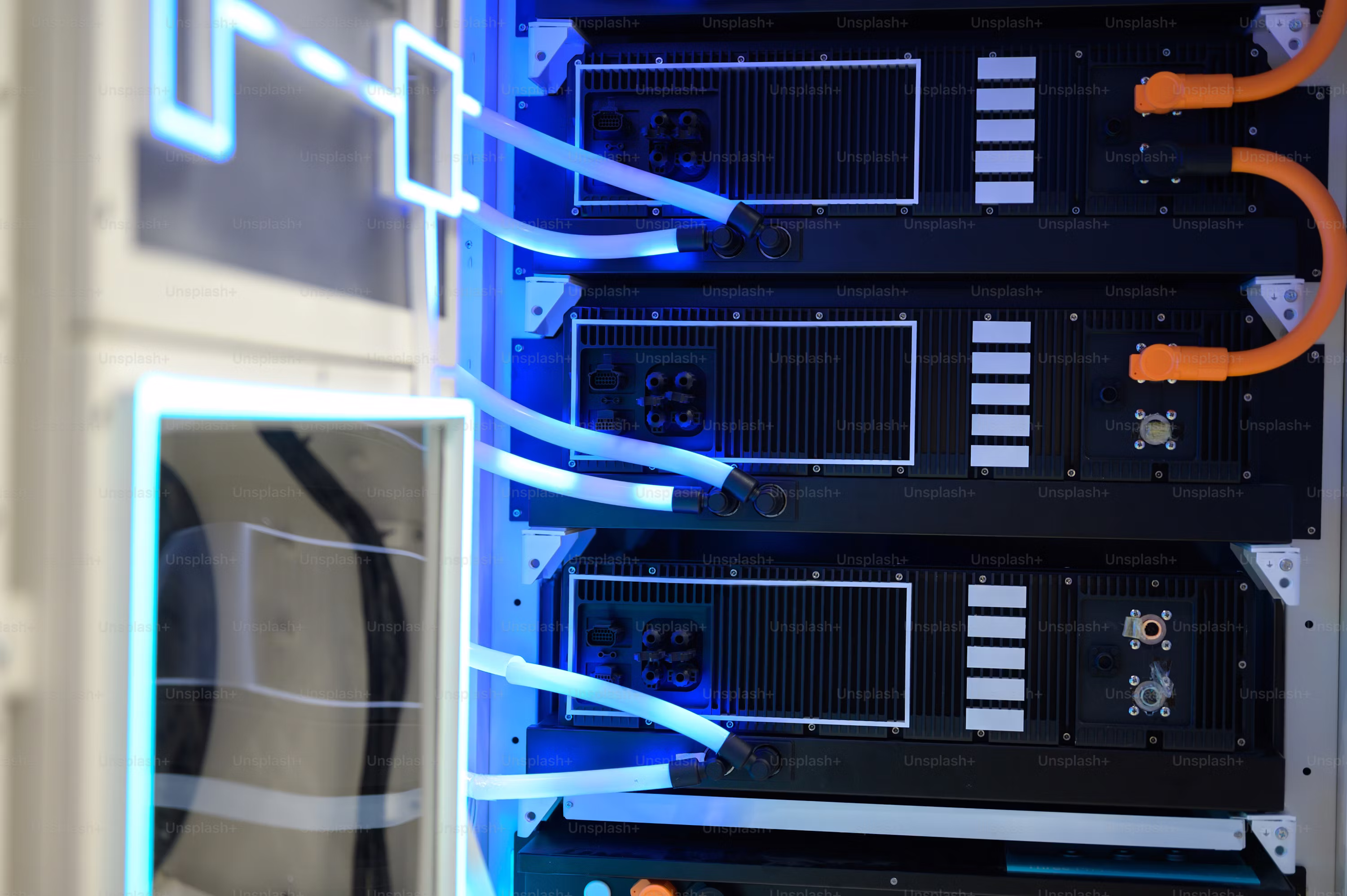 Close view of high-end server rack with liquid cooling, used in data centers  for artificial intelligence, cloud storage, and tech infrastructure  environments. photo – Technology Image on Unsplash